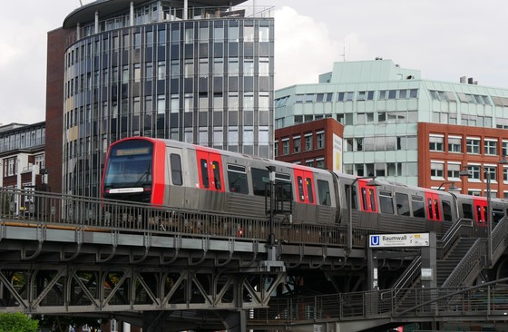 Hamburg Metro DT5 on viaduct leaving the elevated railway station Baumwall in Hamburg- Germany